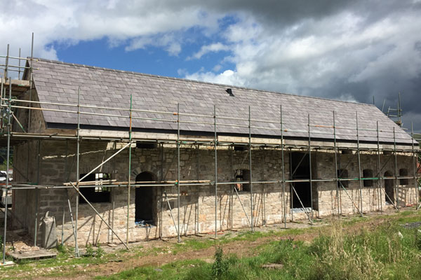 Putting new slate roof on farm buildings