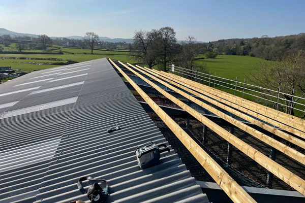 Metal roof at North Wales commercial property