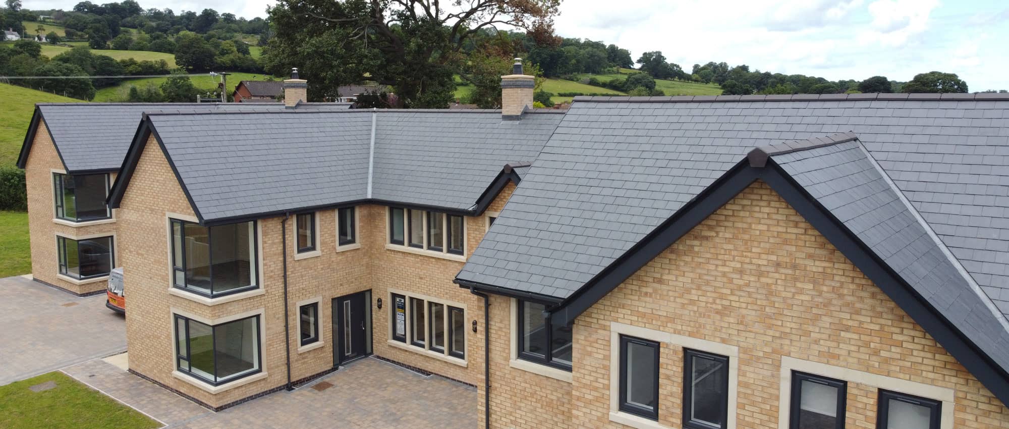 New slate roof on apartment block in Ruthin, North Wales