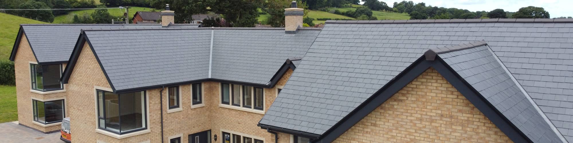 New slate roof on apartment block in Ruthin, North Wales